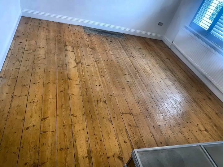 Restored pine floorboards